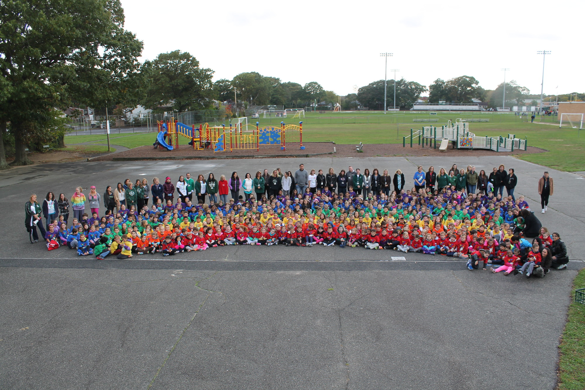 Before beginning their exercise, Seaford Manor students made a rainbow.