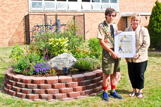 Robert Sirota received a citation from Town of Hempstead Supervisor Kate Murray for his work on a garden outside Seaford High School in Tutaj’s memory.