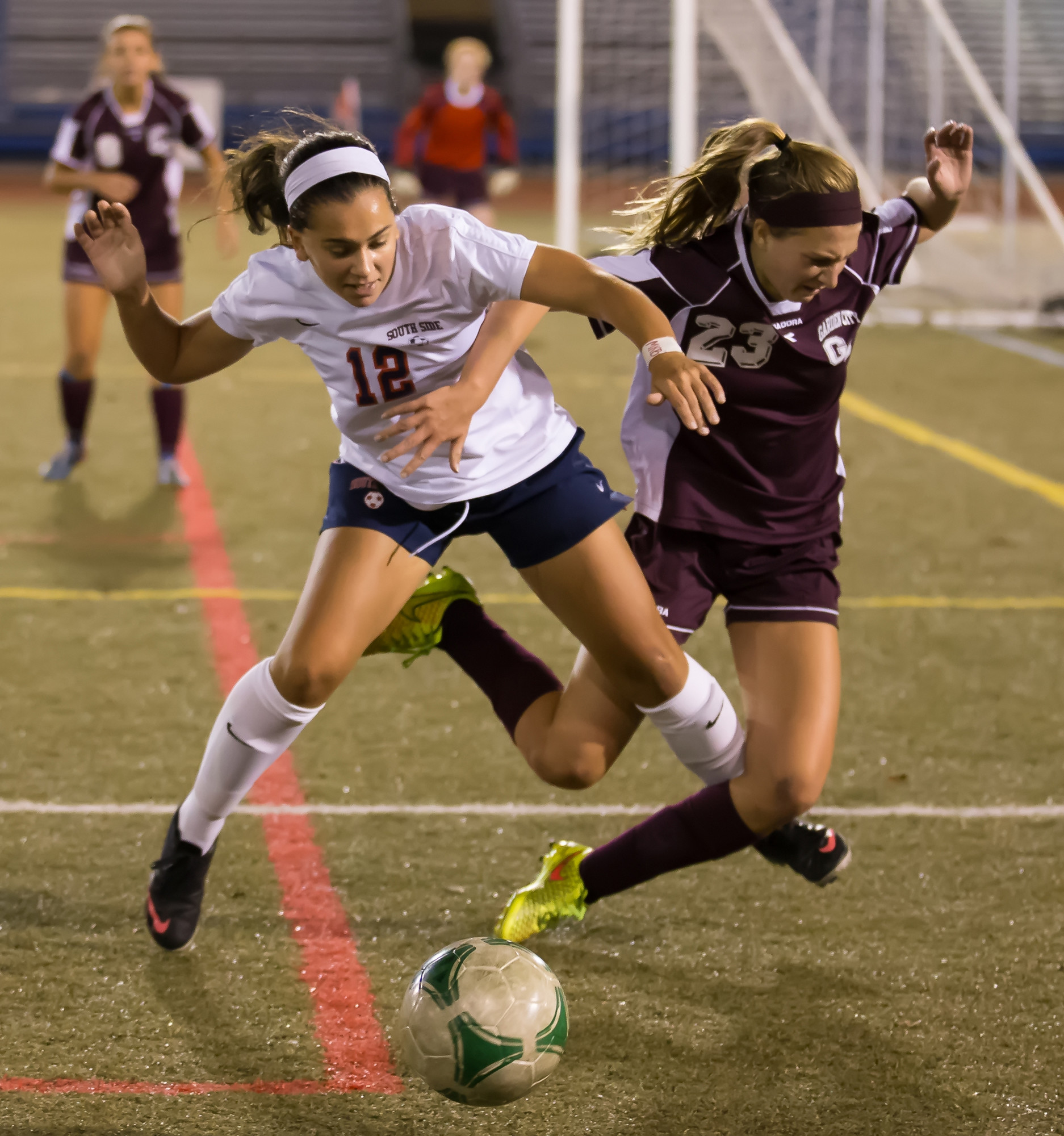 South Side’s Stephanie Leonardo, left, and Garden City’s Kelly Donovan tangled during the second half of the Nassau Class A championship game.