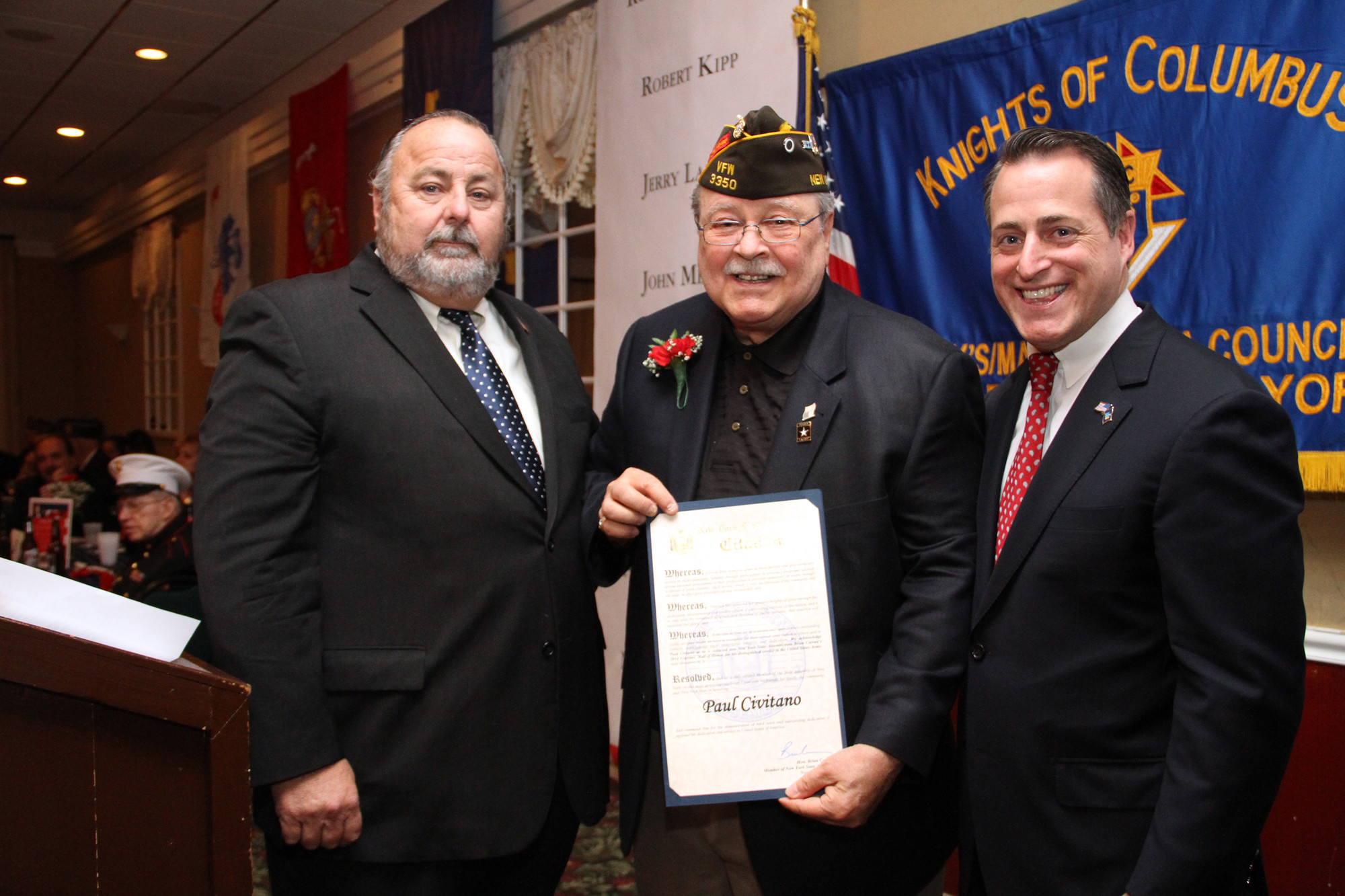Mayor Francis X. Murray, left, and Legislator Brian Curran congratulated Paul Civitano.