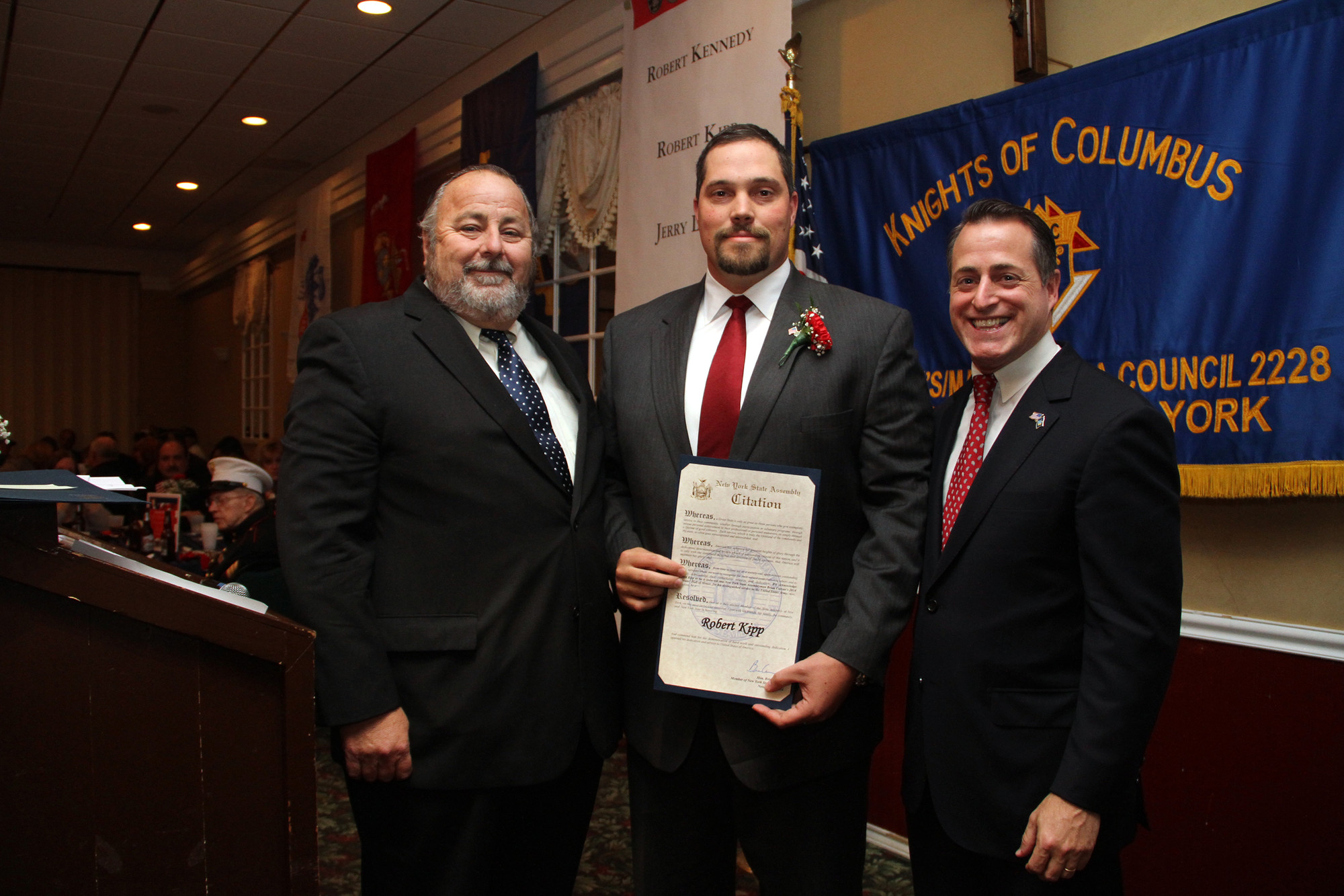 Robert Kipp, center, was honored by Mayor Francis X. Murray, left, and Legislator Brian Curran.