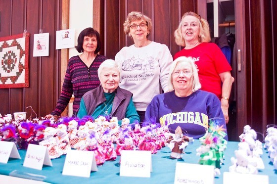 Members of the Mice Ladies, from left, Ruth Grasiano, Edna Woodberry, June Gerbracht, Sharon Davis and Thora Heeseler sold this year’s collection of Christmas mice ornaments at the Church of St. Jude Country Fair on Nov. 8.