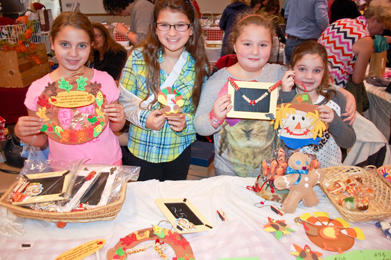 Children from the Sunday school, including Lauren Gomez Nieto, Nina Scanze, Elizabeth Manton and Paige Gomez Nieto, sold their handmade crafts.