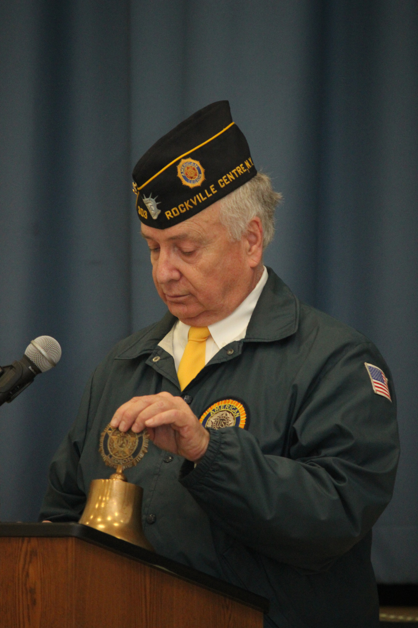 American Legion Post Commander Joseph Scarola rang the bell at 11:11 a.m., marking the time at which World War I ended.
