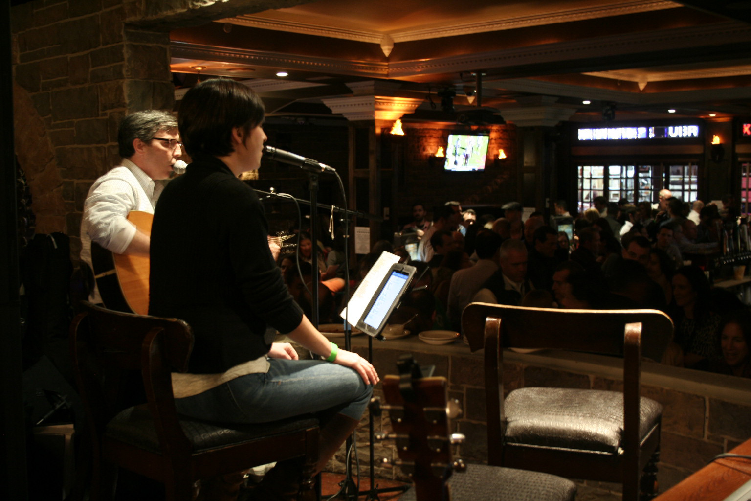 Matt Barthel and Tricia Seifert performed song covers for the packed bar.