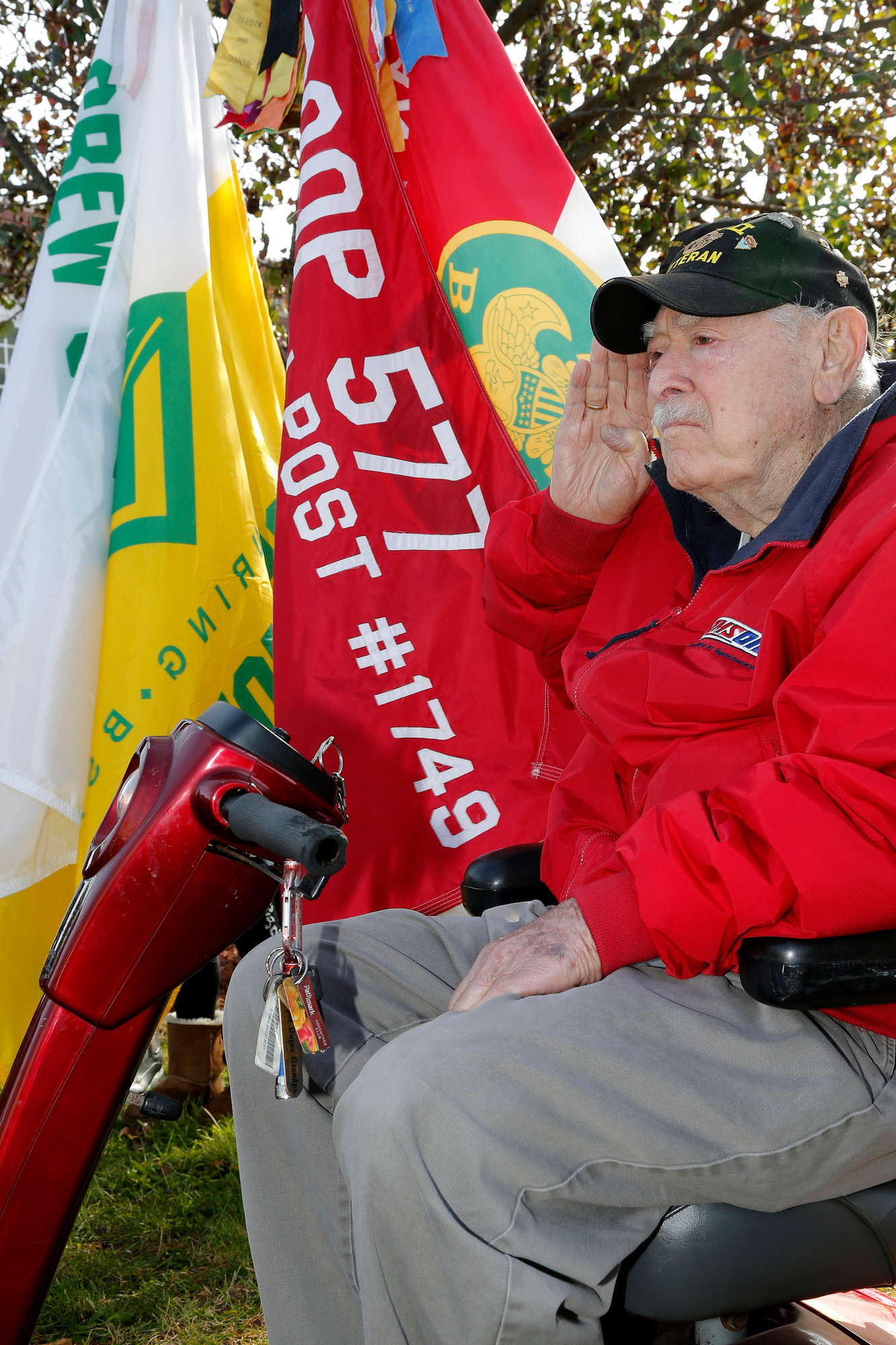 World War II  U.S  Army veteran Chirs Iannacone, 91, saluted as the National Anthem was played.
