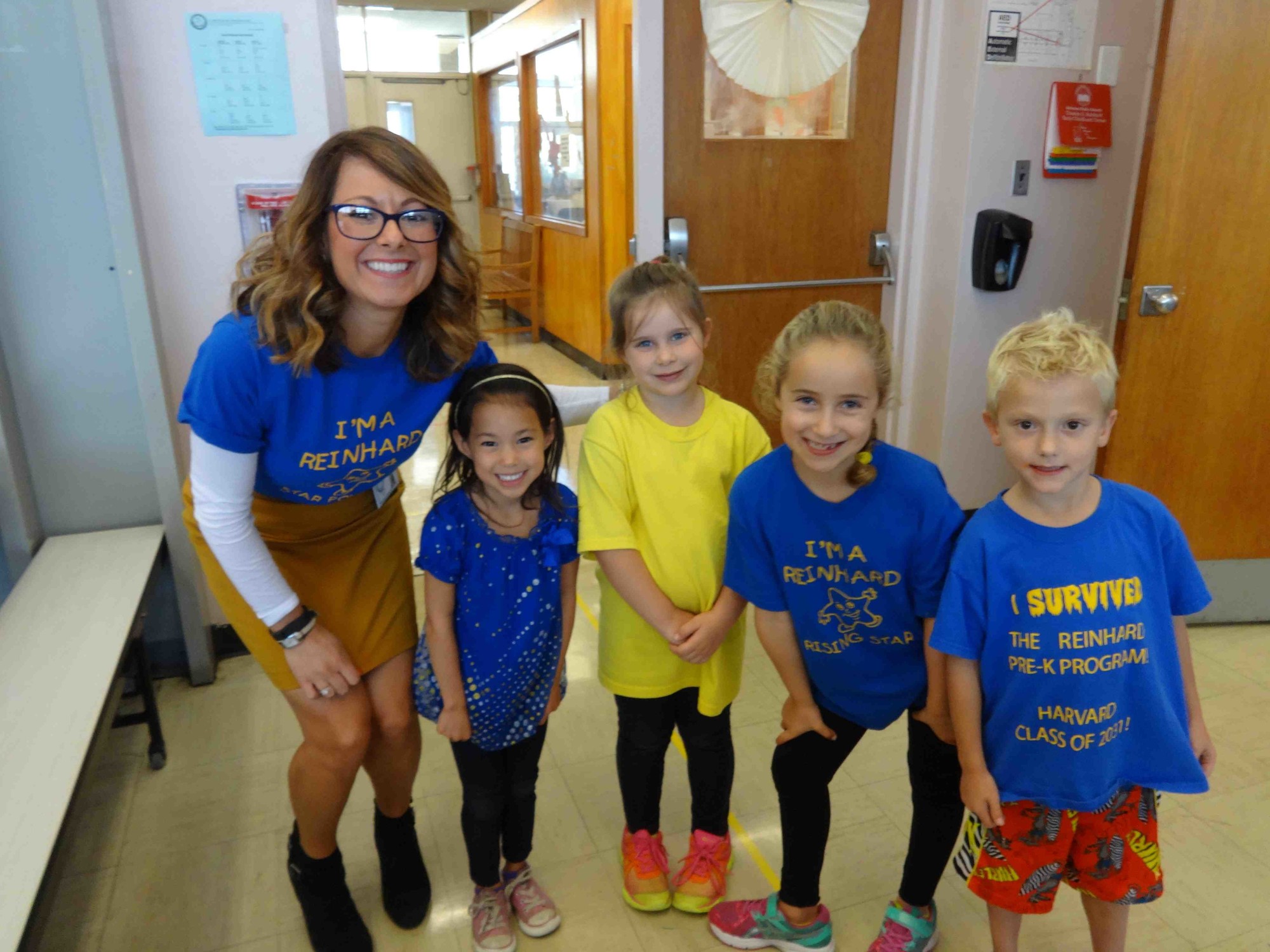Elise Cahill, Reinhard’s assistant principal, and students celebrated School Color Day by wearing Reinhard blue and yellow.