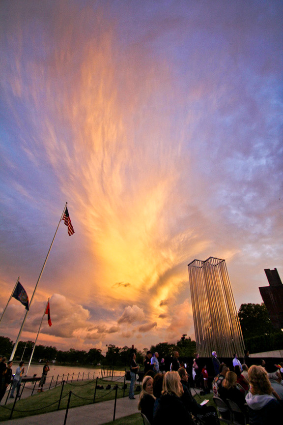 The cloudy sky broke just in time for a beautiful sunset during the start of the September 11th ceremony in Eisenhower Park. This cloud looked like an angel wing on the side of the 9-11 monument, almost like a sign that those we have lost were looking down on us.