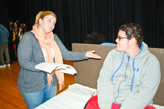 Director Lisa Levenberg goes over a scene with lead actor Ted Fiber, who is playing Tevye.