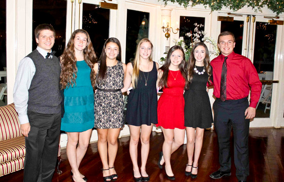 New members of the East Meadow High School Chapter of the National Honor Society enjoyed their memorable night at Milleridge Cottage on Nov 3.