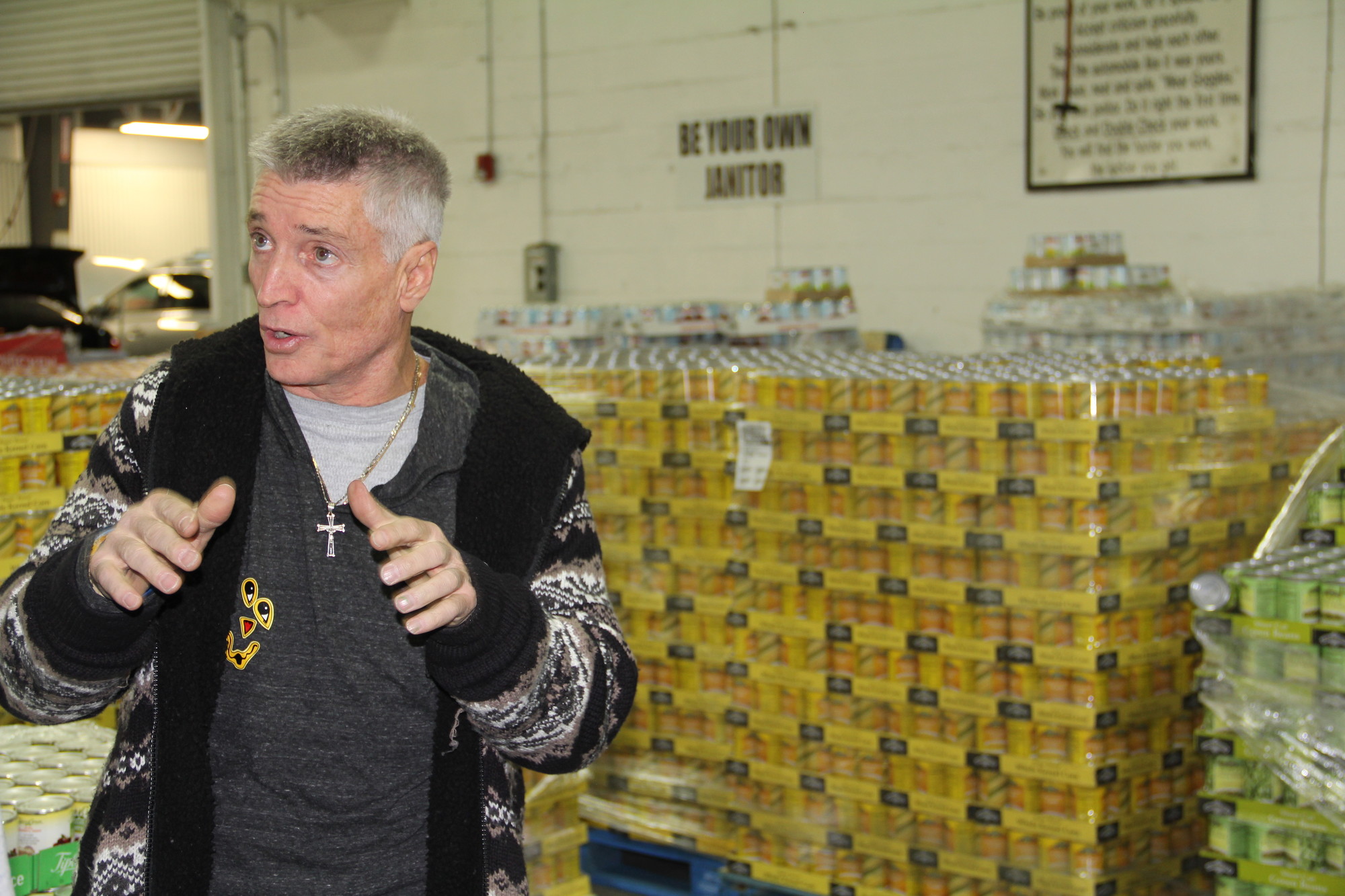 Mid-Island Collision owner Bob Jesberger has purchased $150,000 of food to give to those who need it.