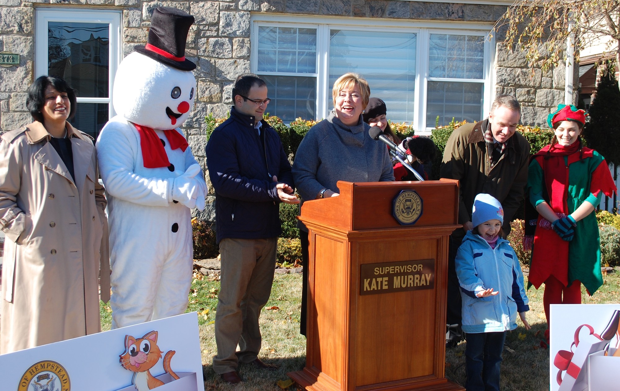 Hempstead Town Supervisor Kate Murray, joined by other town officials and some seasonal characters, announced the start of the Home for the Holidays pet adoption program at the home of Ed and Laura Ra.