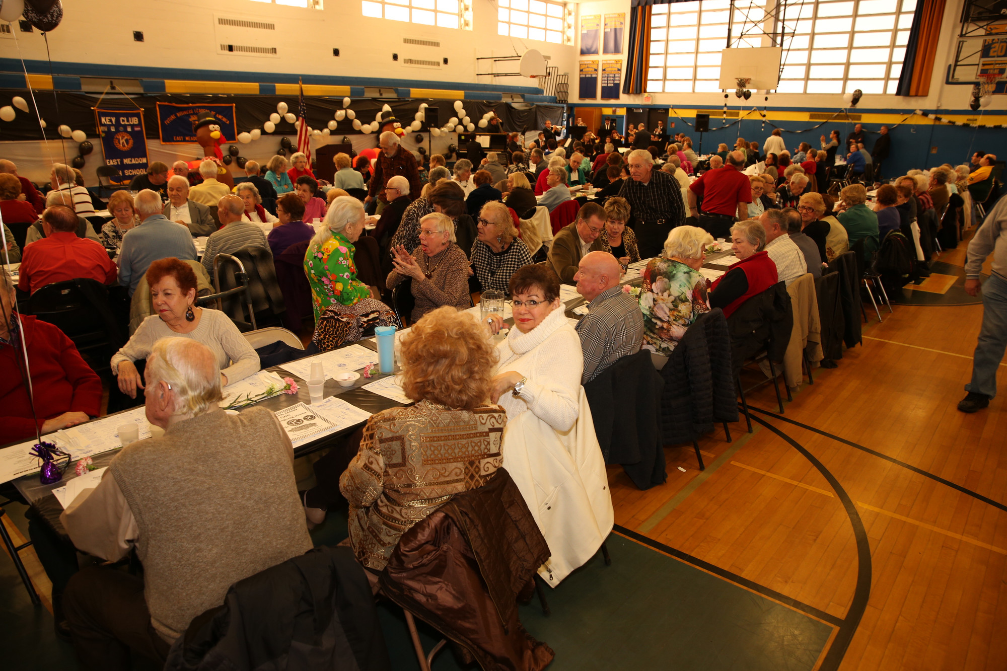 Hundreds of seniors came to the East Meadow High School gymnasium for a Thanksgiving meal last Sunday, courtesy of the East Meadow Kiwanis Club.