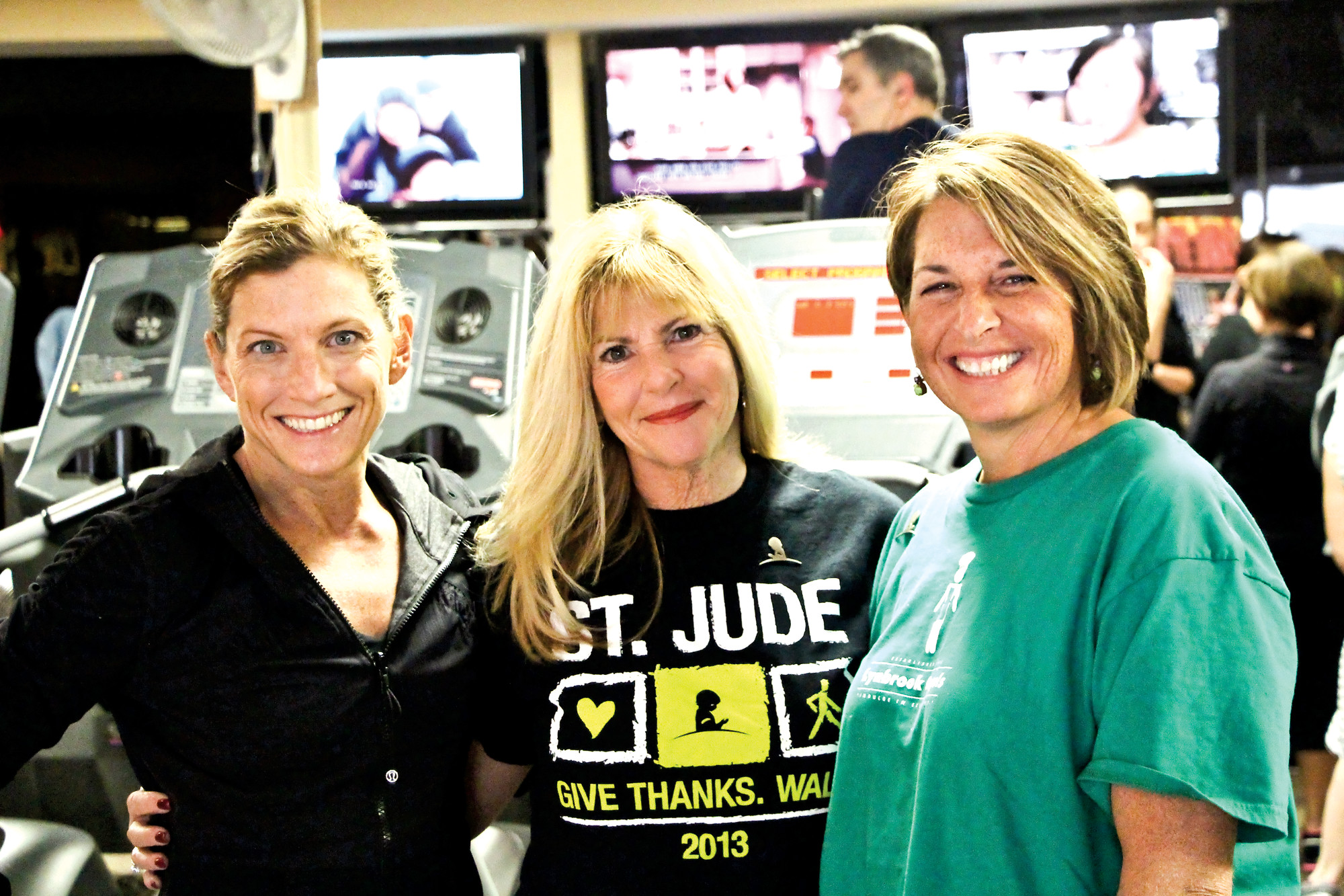 Instructor Carolyn Mellace, left, organizer Patti Birnbaum and Deena Clancy of Lynbrook Bagels. The three women worked together to raise more than $8,000 for St. Jude Children’s Research Hospital.