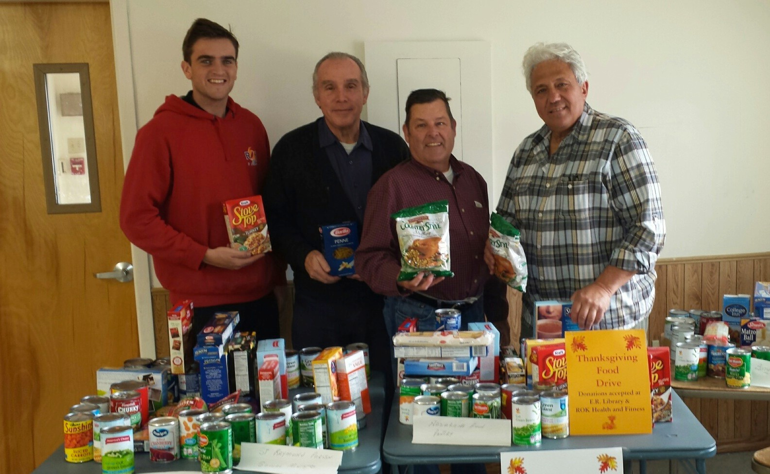 Craig D'urso, left, Al Compagnoni, Ed Corrado, Stanley Lombardo and Mike Hawksby (not pictured) sorted the food that they collected to distribute to local food pantries.