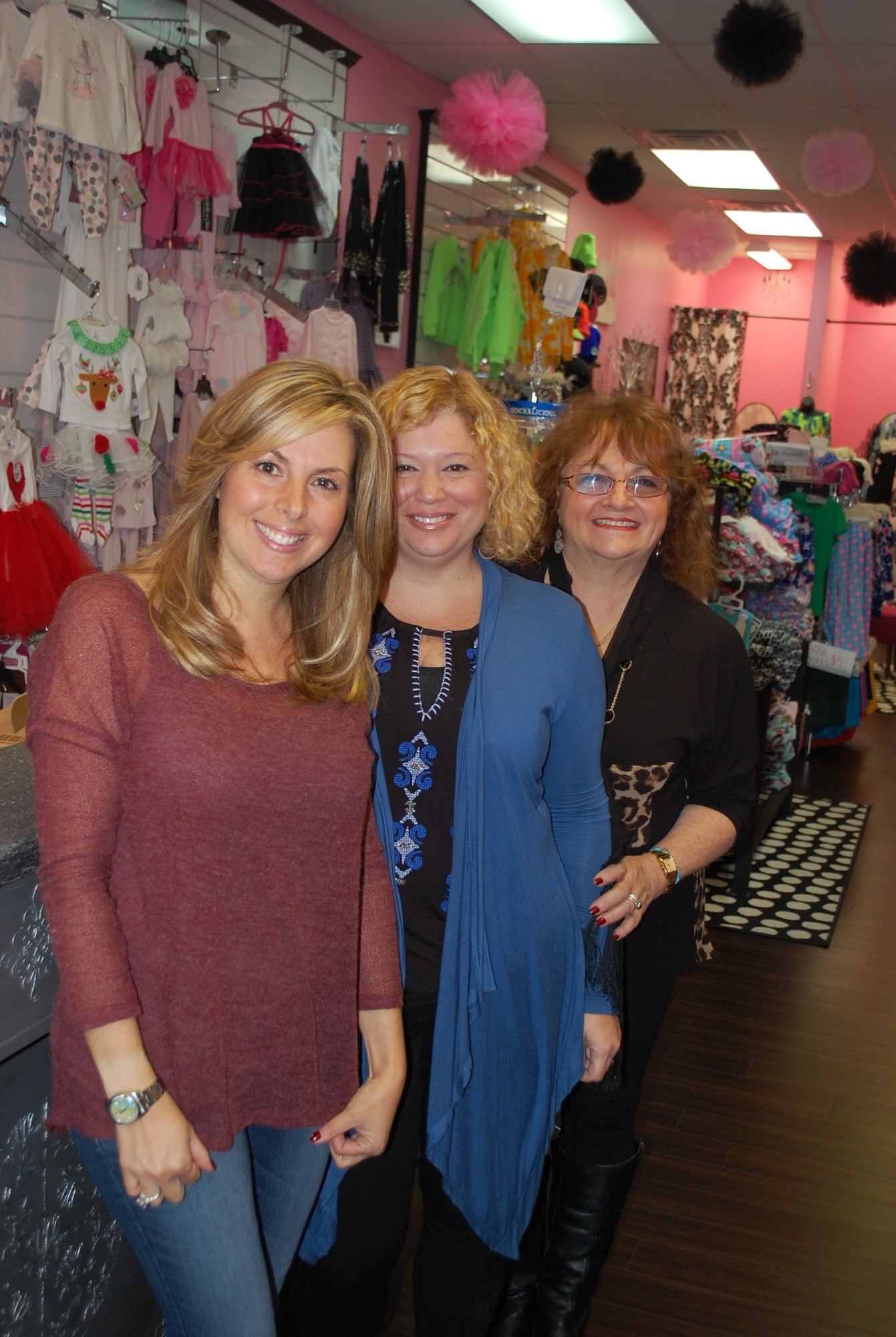 Coco Belle Boutique owners Jeanine Janosko, Dawn Corso and Anne Puccio set up shop in the Cherrywood Shopping Center.