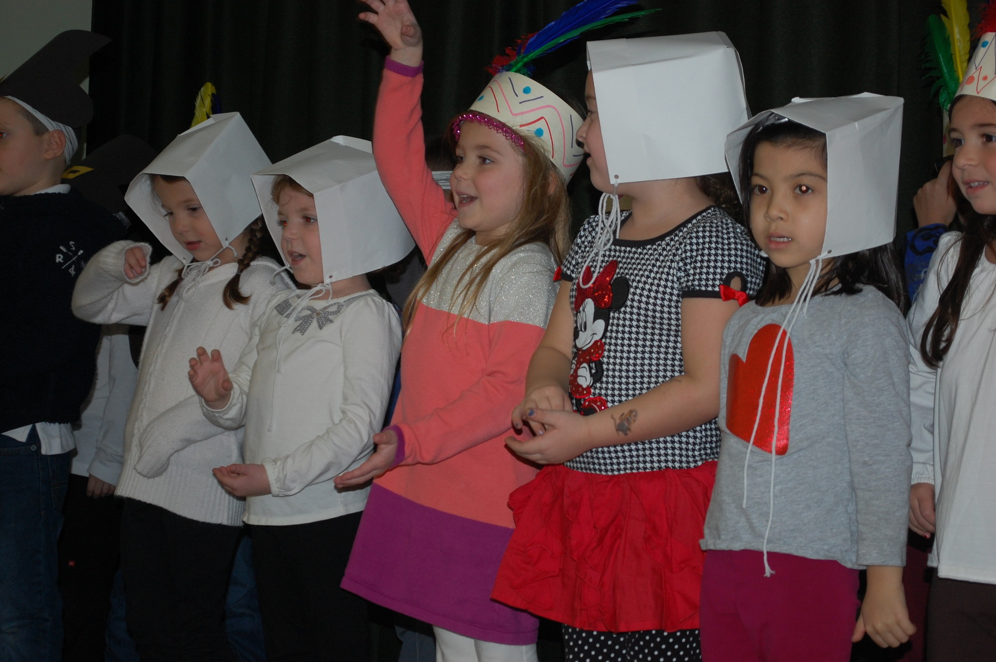 Before enjoying a feast, Lee Road School kindergarten students sang a few seasonal songs for their parents while dressed as Pilgrims and Native Americans.