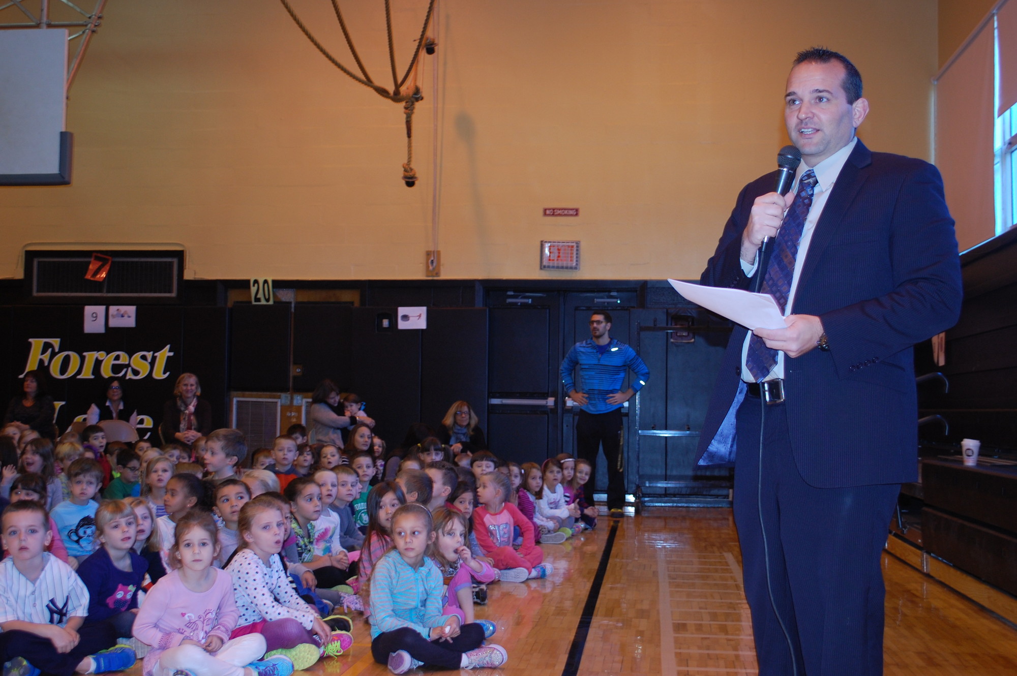 Forest Lake Principal Anthony Ciuffo greeted children at the Nov. 19 morning program.