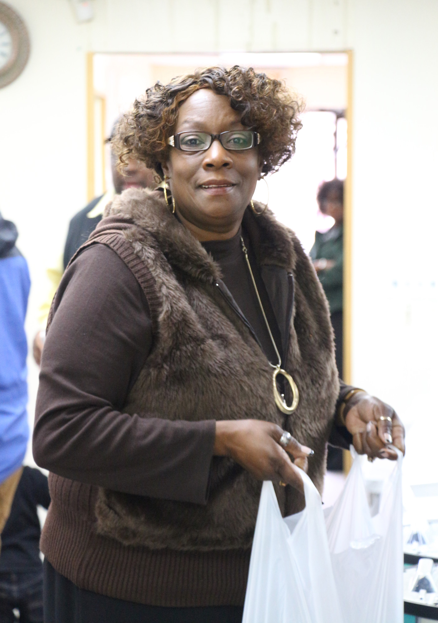 Katherine Williams, the founder of the Helping Hand Ministries, handed out meals.
