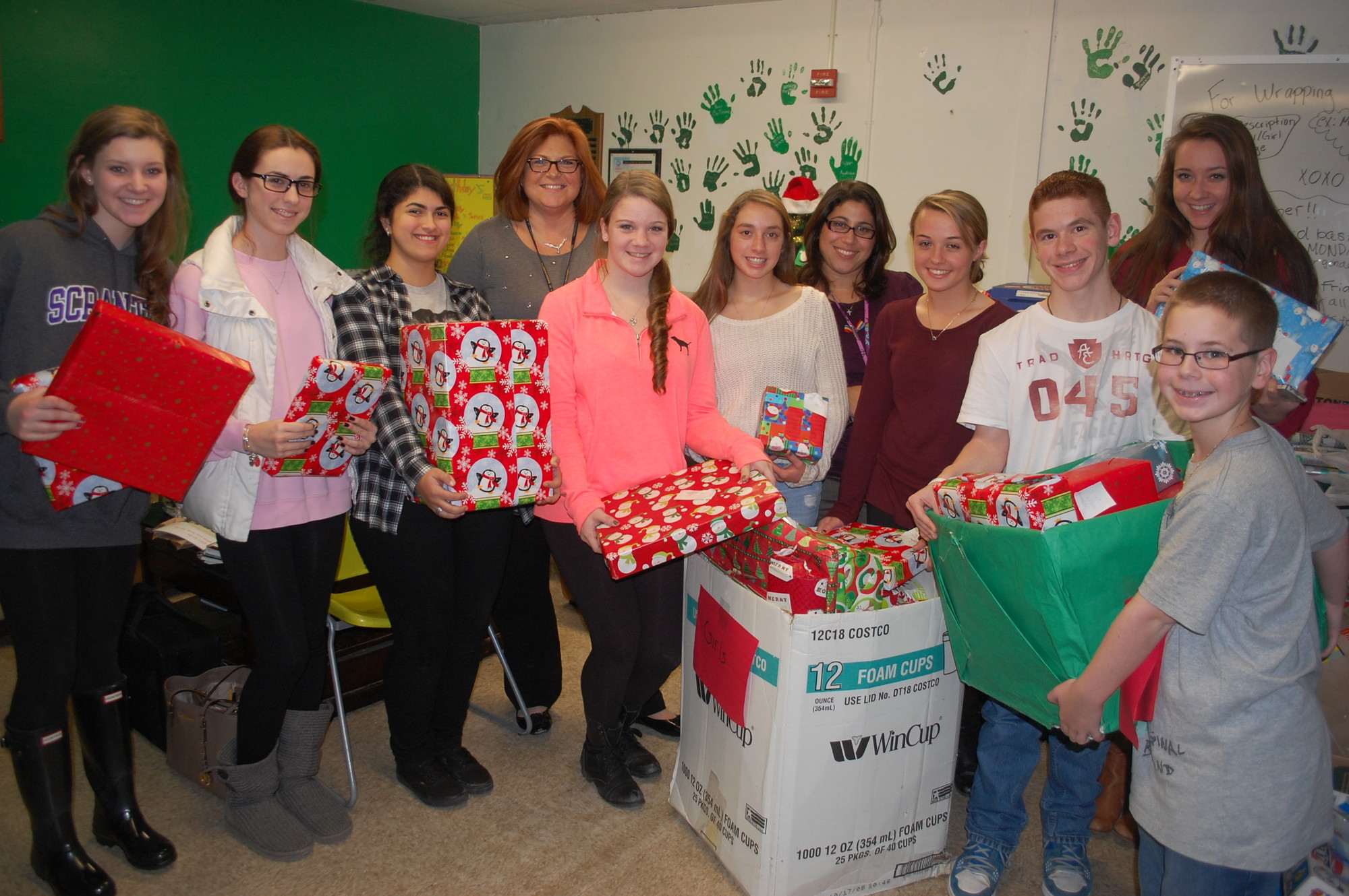 The Seaford High School Student Council is collecting toys to give to needy children on Long Island. Pictured are members Kristina Bouretis, Alexa Meyer, Kelly Chamberlain, Amanda Cupo, Anna Gagliano, Cassidy Meyer, Conor Crean, Noah Crean and advisers Shari Raduazzo and Tania Cintorino. Not pictured are Maggie Crean, James Irwin, Ben Schwartz and Nicole Anastasiou.