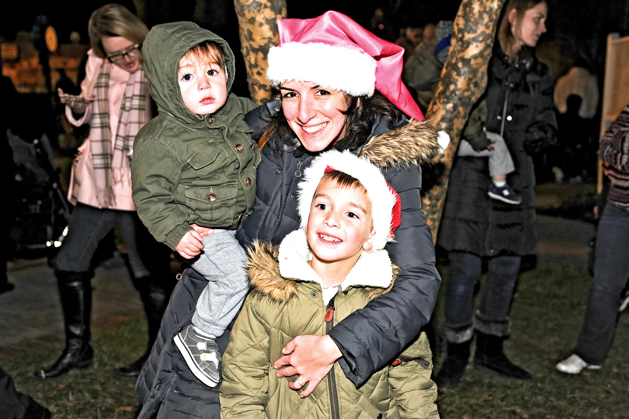 June Wildes, with children Brody, 1, and Brayden, 4, were feeling the holiday cheer.