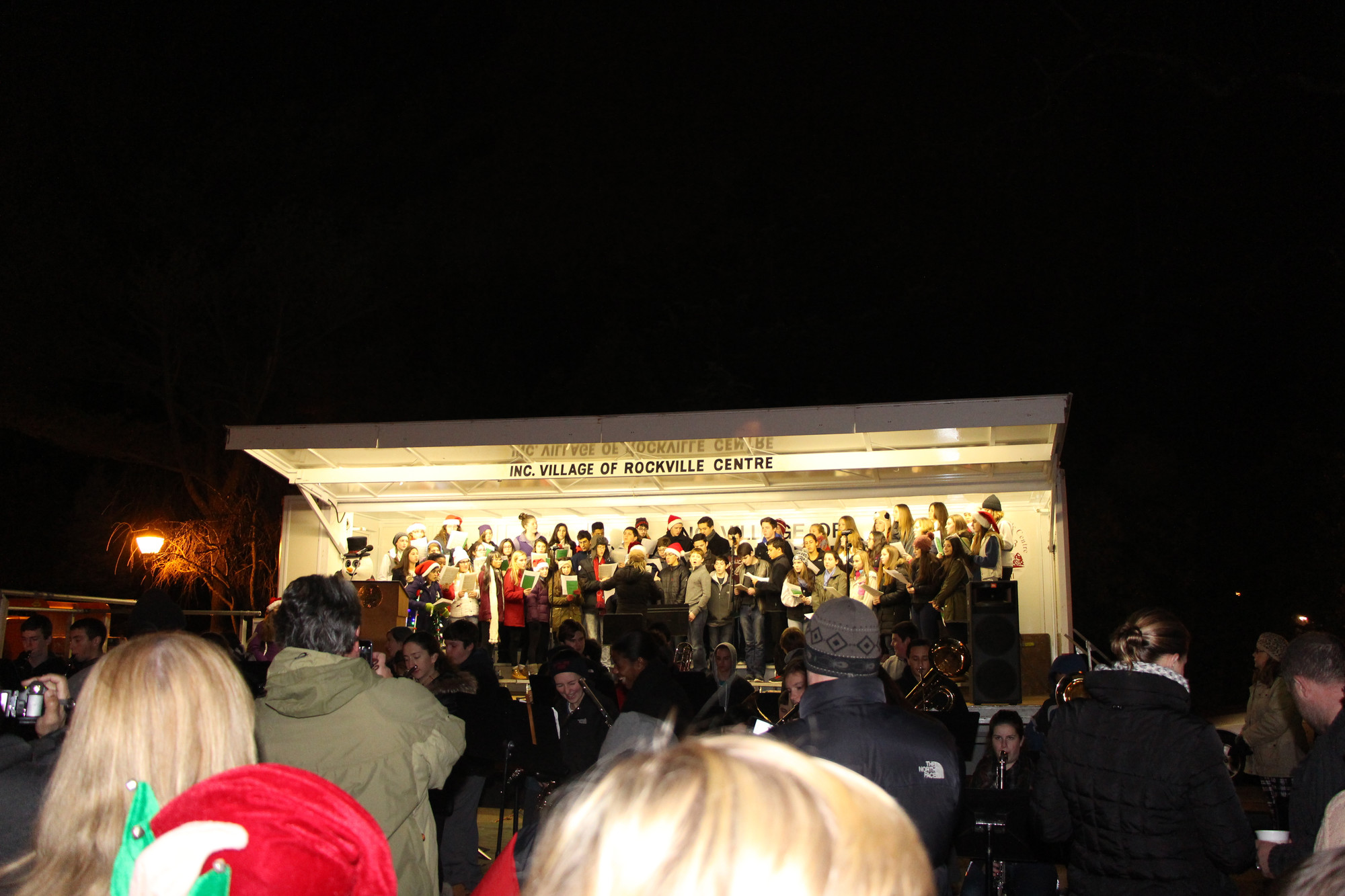 Many people from the Rockville Centre Community came out to hear and watch the South Side Band and Choir sign holiday songs at the Dec. 4 tree lighting.