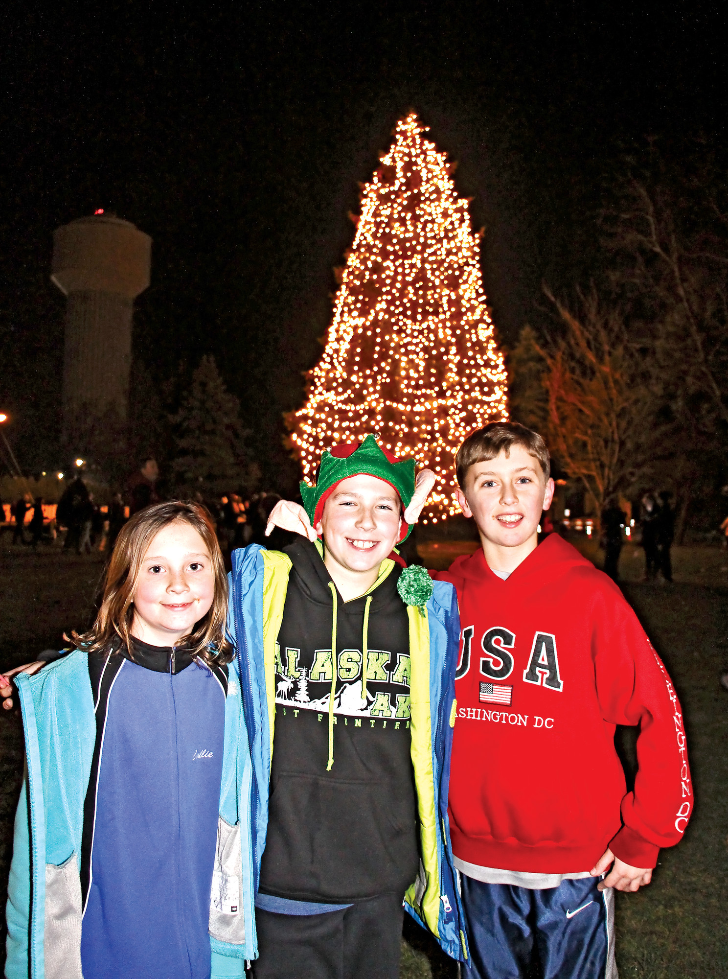 Callie O’Connell, Alex Cerabone and Chris Rosenbaum were in the holiday spirit at the lighting of the Rockville Centre Christmas tree on Dec. 4 on the Village Green. The event also featured entertainment and a visit from Santa.