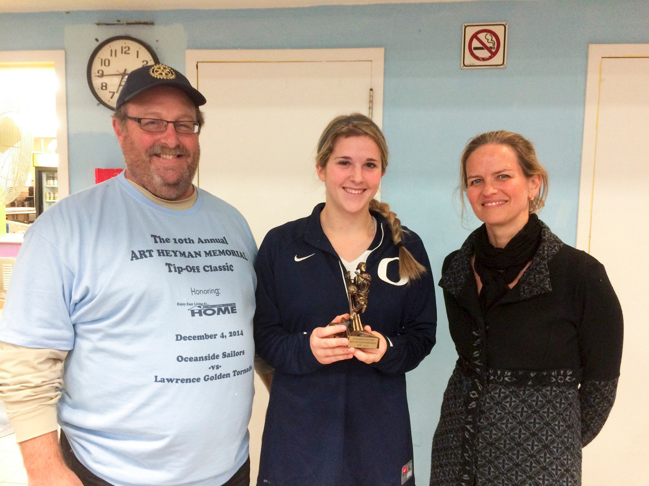 Oceanside Rotary President Jeff Toback, OHS Girls’ MVP Mara Stewart, and Nassau County Legislator Laura Curran.