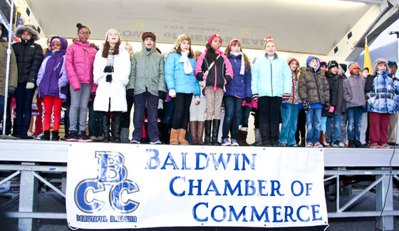 The Plaza Elementary School Select Chorus sang several holiday songs.