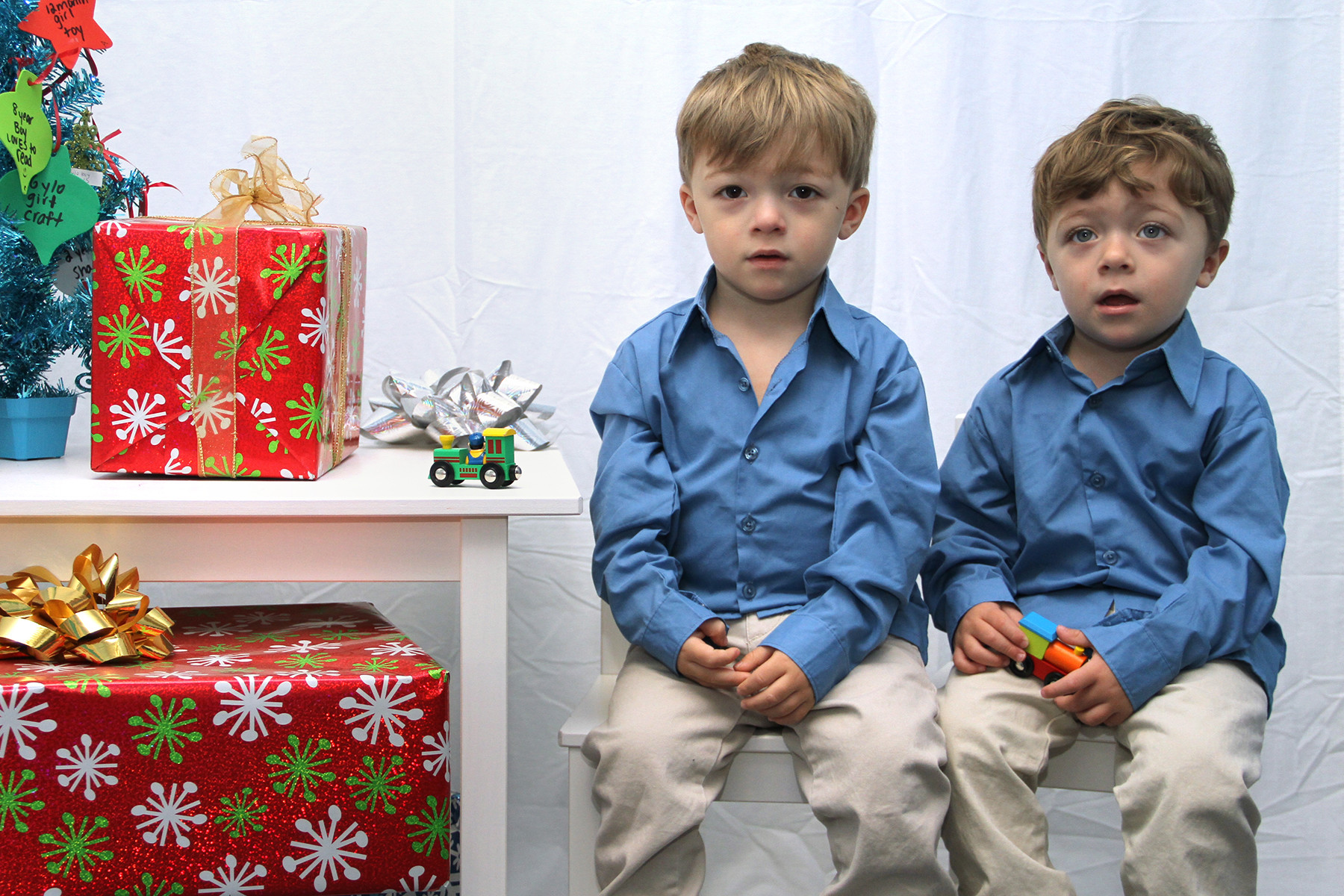 Twins John and Michael Vicario got their holiday photo taken by Kids First.
