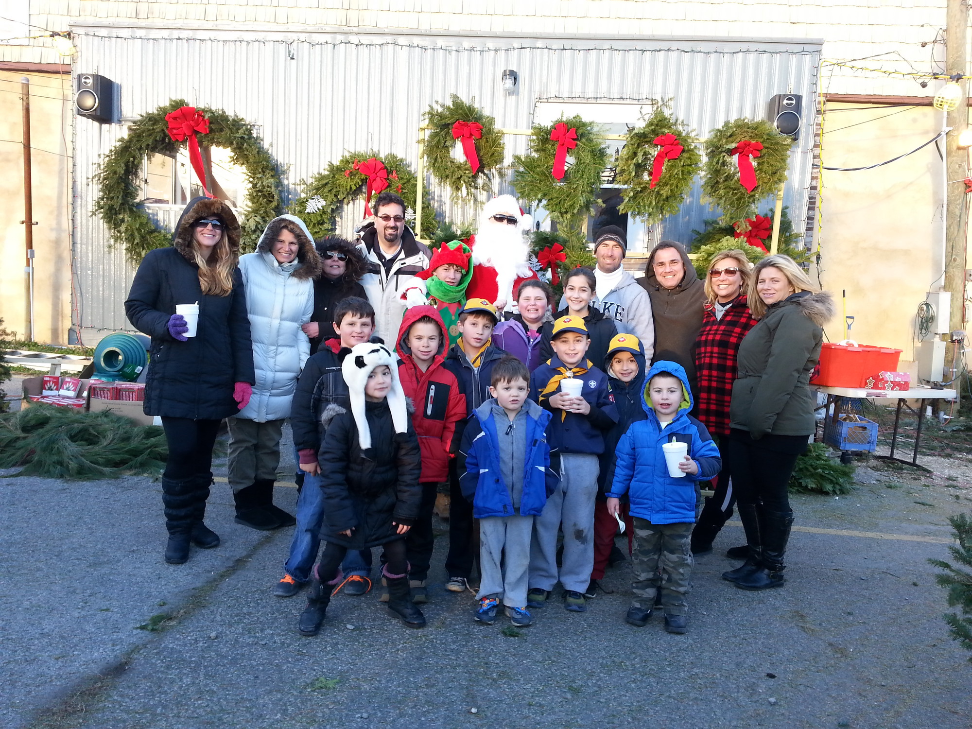 Cub Scouts and parents selling trees.