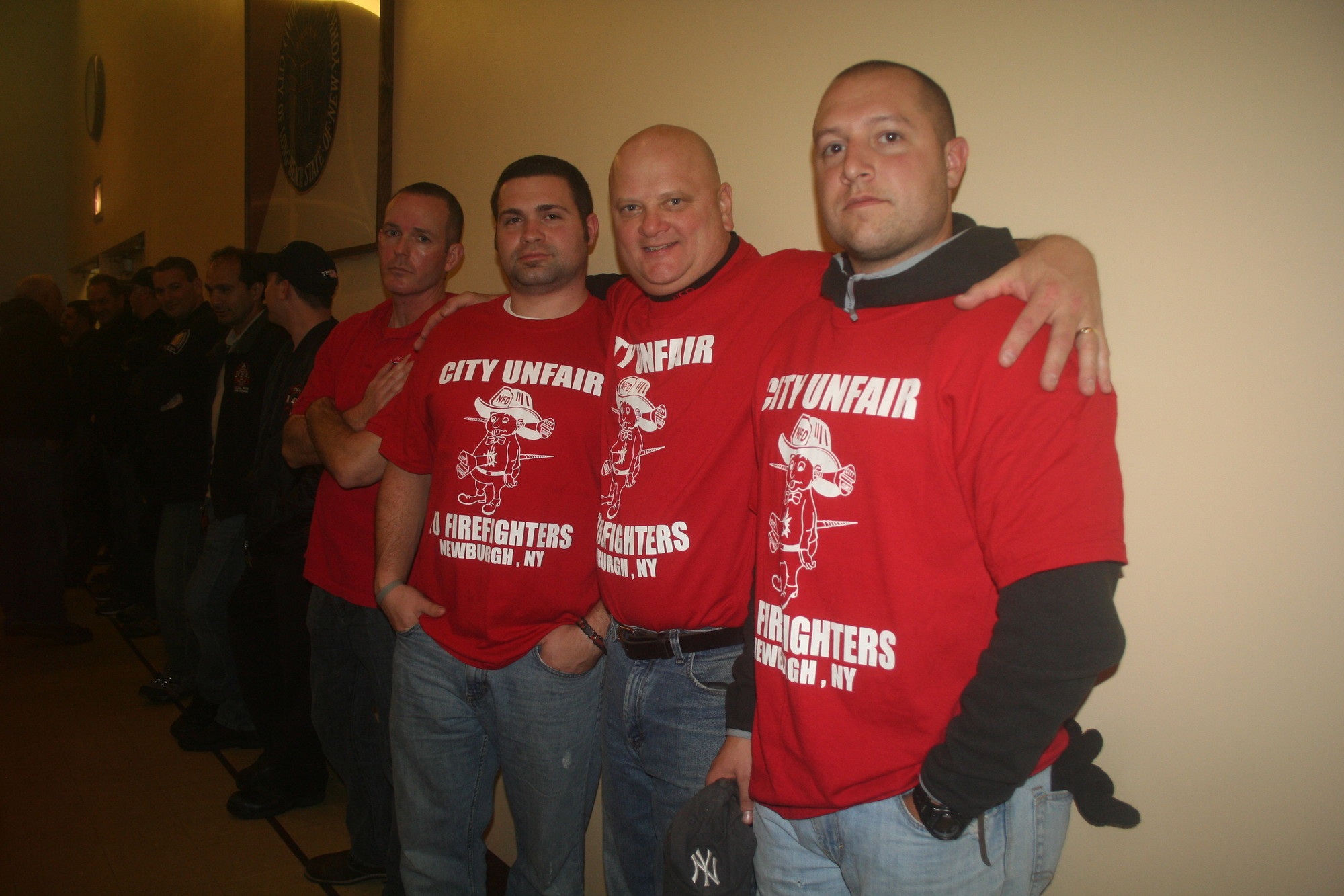 Many in the crowd, including firefighters from Newburgh, N.Y., wore red.