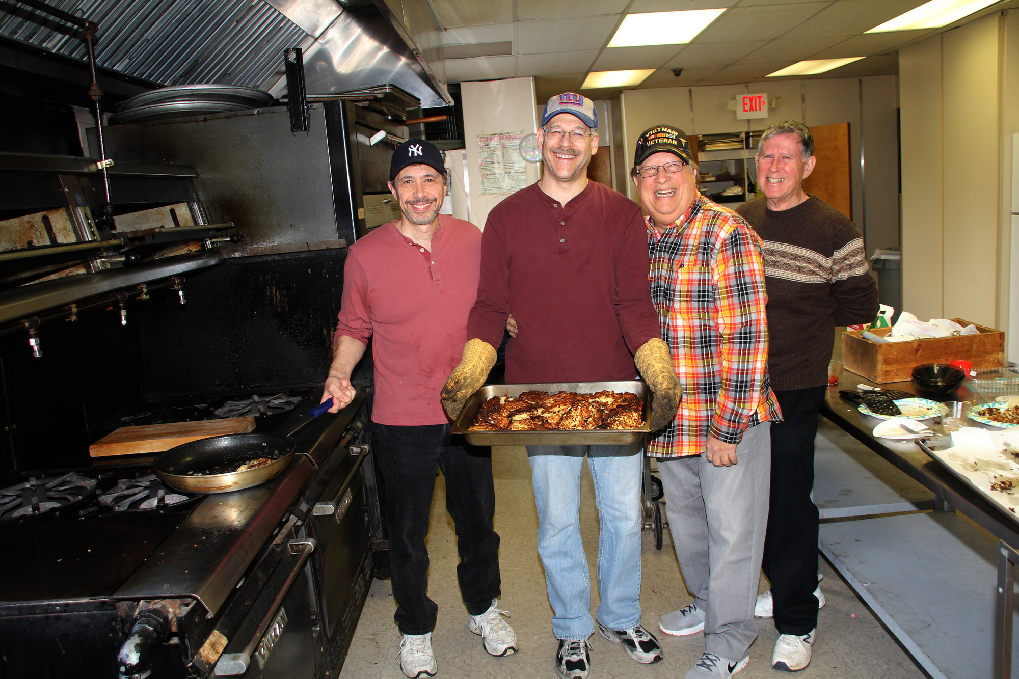 Volunteers from the Brotherhood prepared the latkes for all to enjoy.