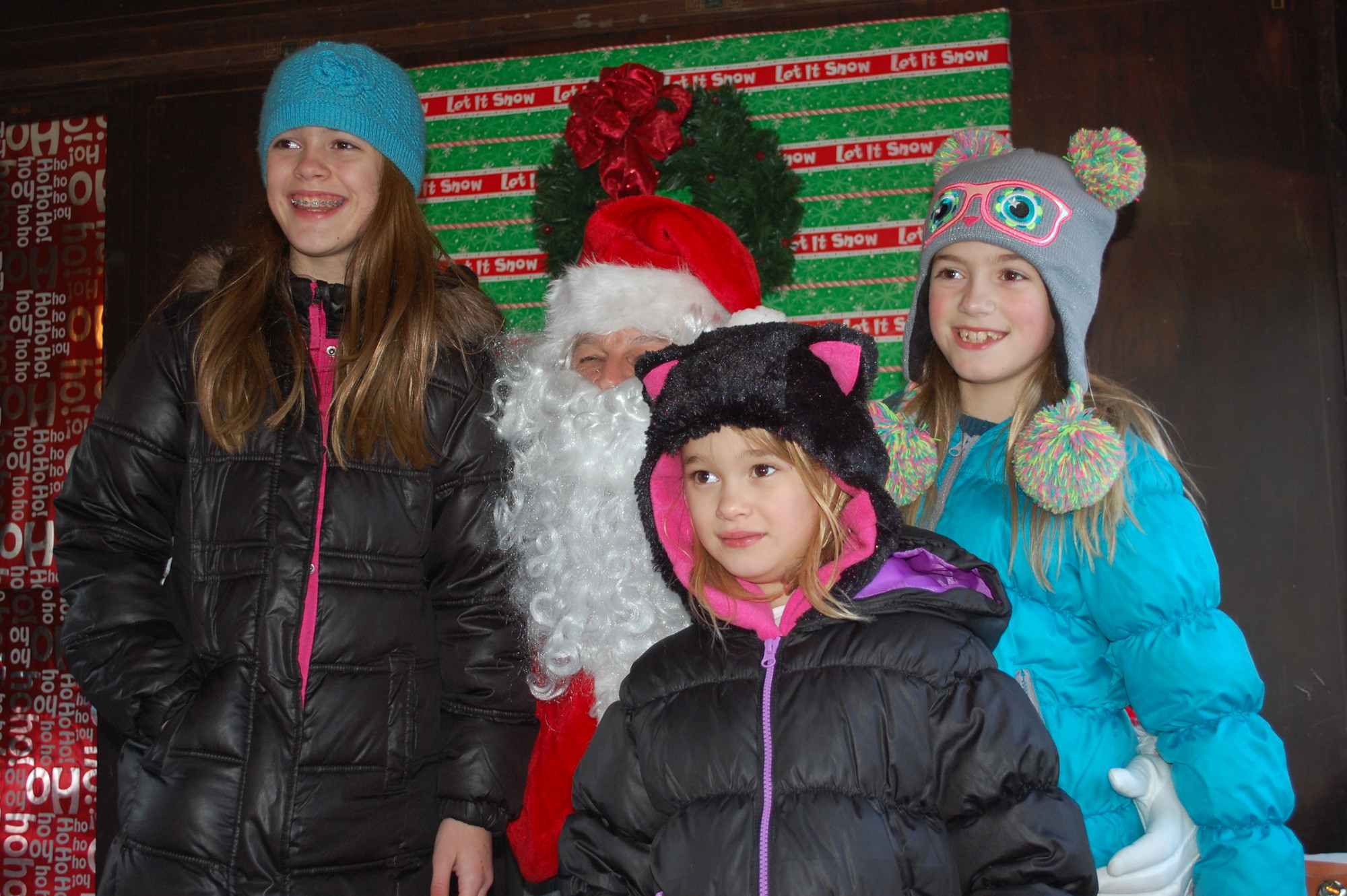 Mya Cocchiola, 11, and sisters Emma, 6, and Julia, 8, visited Santa.
