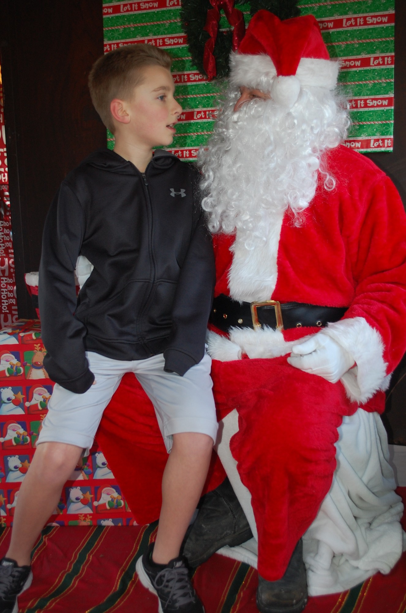 Matthew McCoy, 10, in slightly out-of-season clothing, visited Santa in the historic train car during the Wantagh Preservation Society’s holiday open house on Dec. 14.