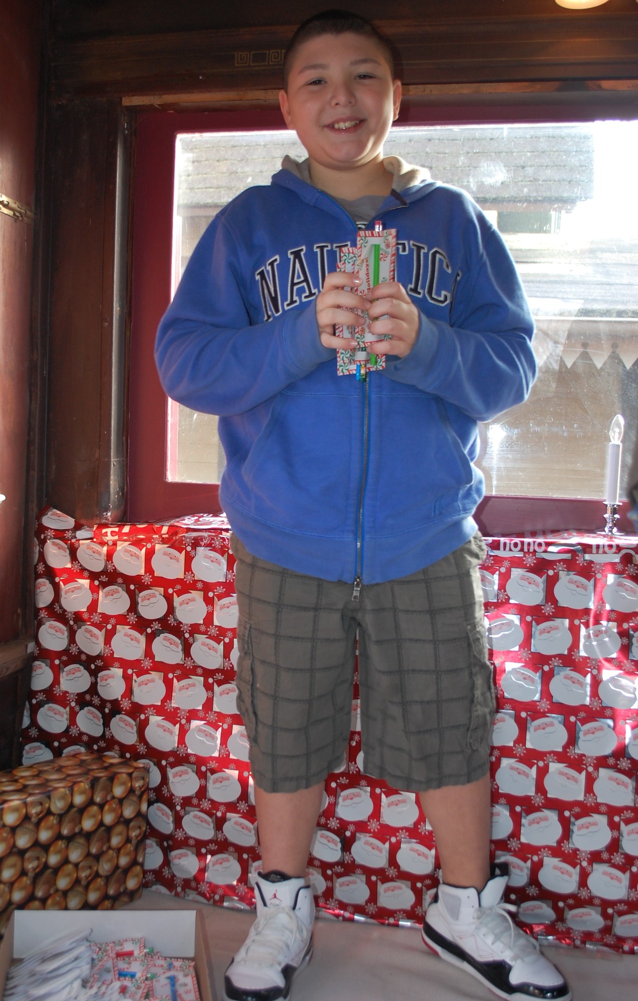Thomas Dafnos, 12, handed out gifts to all of the visitors.