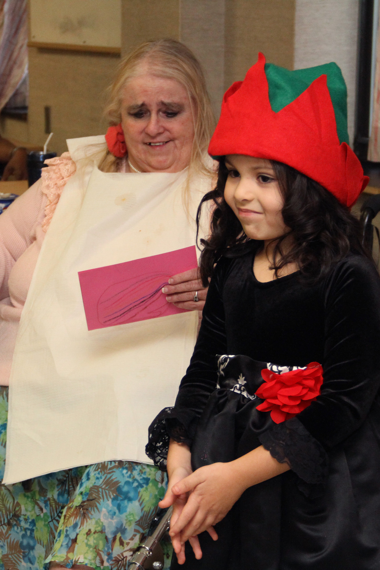 Ava Mosey handed out homemade Christmas cards to residents.