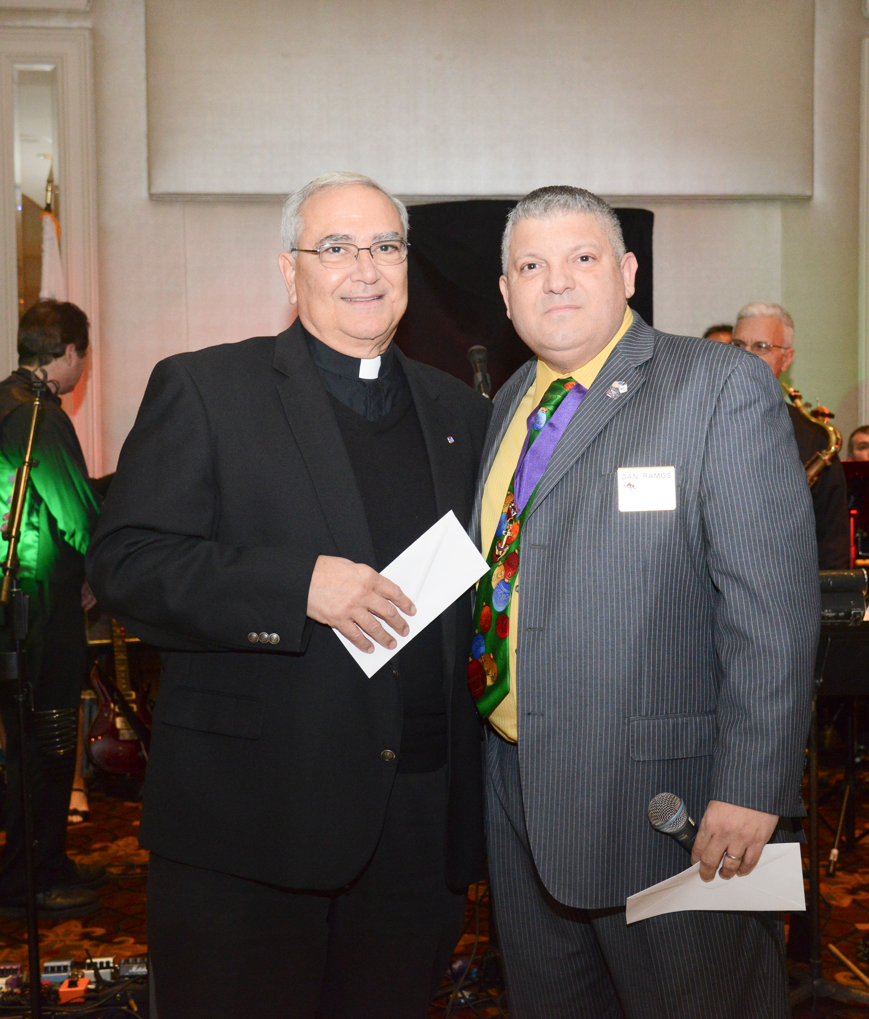 Fr. Lombardi was presented a check for $10,000 to  St Anthonys by Dan Ramos, the Grand Knight.