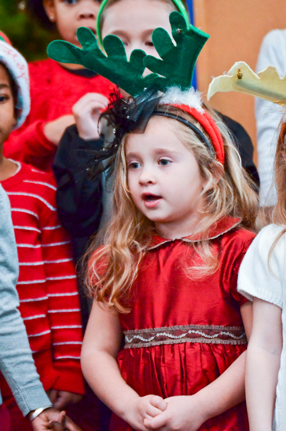 Emilia Goldman, 4, sung holiday tunes last week.
