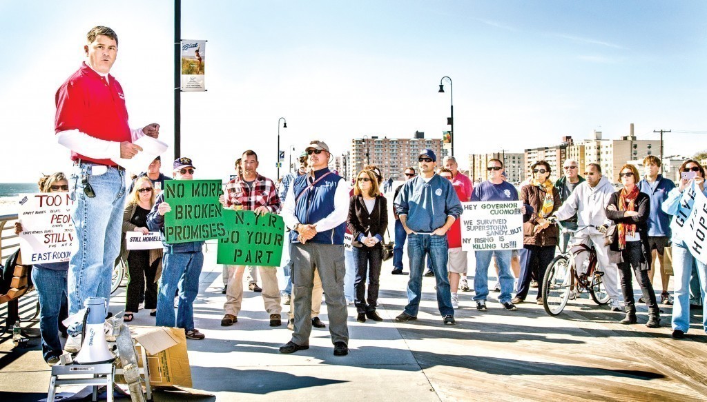 Kevin reilly led a rally on the boardwalk on Oct. 25, where he and other Hurricane Sandy victims called on New York Rising to correct what they describe as an inefficient rebuilding program that has delayed the return of many residents.
