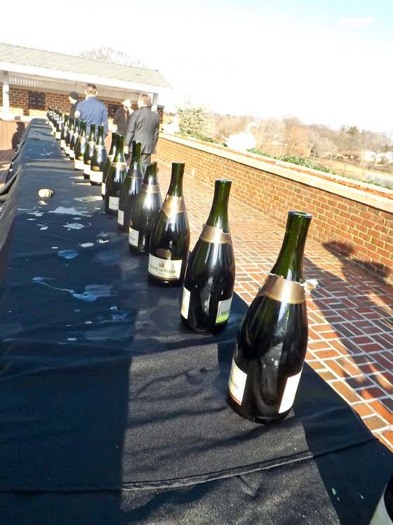 A long row of sabered champagne bottles were intact.