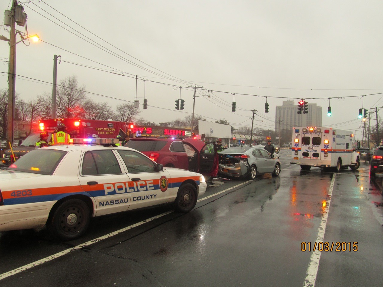 The accident, on eastbound Hempstead Turnpike, resulted in one driver being hospitalized with a head injury.