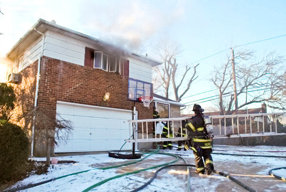 firefighters battled flames in frigid weather inside a Bryant Street home on Jan. 8.