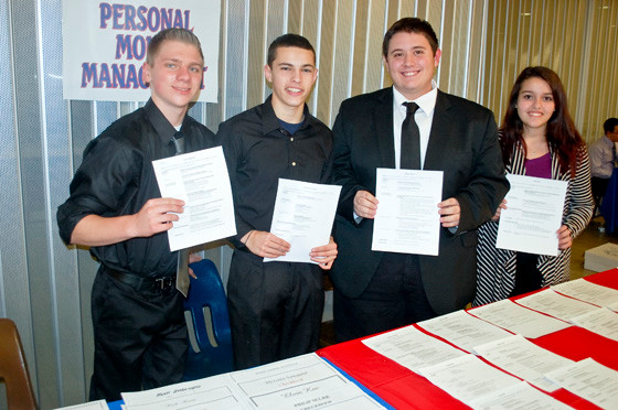 Showing off their resumes were students in the personal money management class, from left, Kyle Jankowski, Giovanni Tavolacci, Thomas Pallini and Elvin Koc.