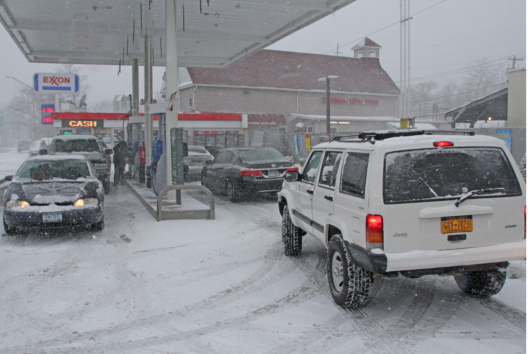 Cars lined up for gas at the Exxon Station on Sunrise Highway and Wantagh Avenue.