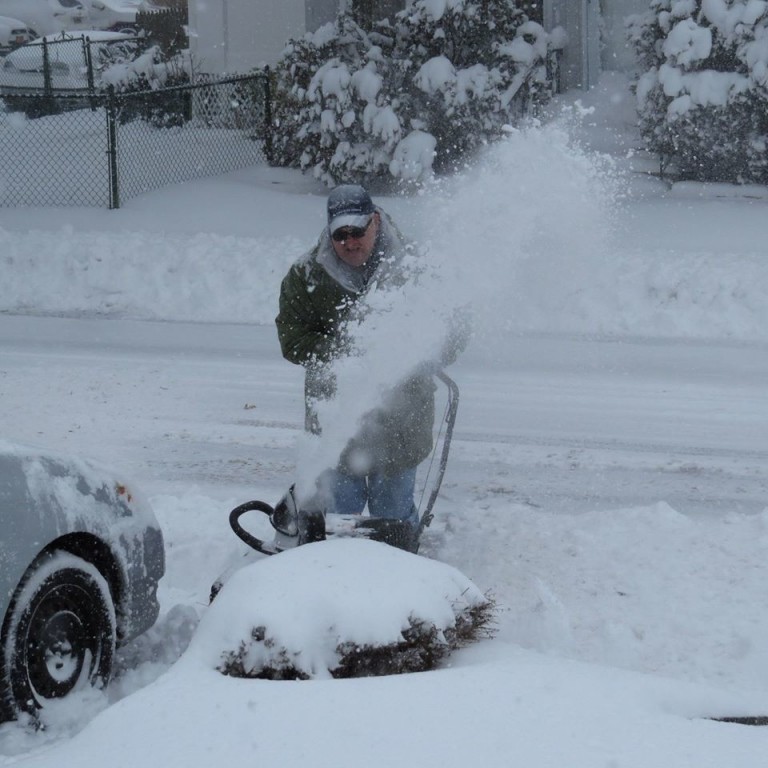 Rich Damm was busy on Tuesday putting his snow blower to good use.