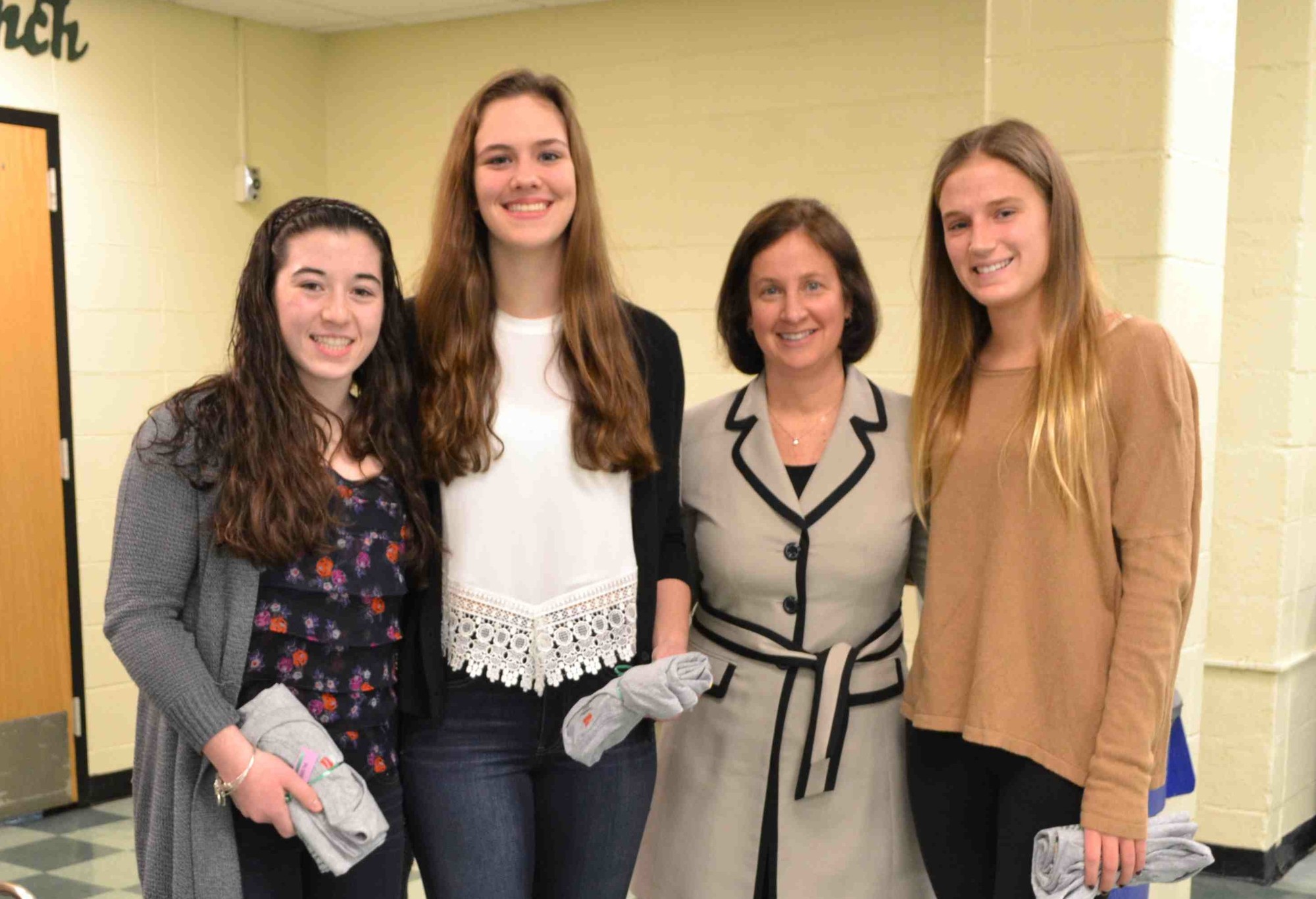 Dr. Burak honored Stephanie Milillo, Shannon Wren and Patty Loonie for their All-State athletic achievements.
