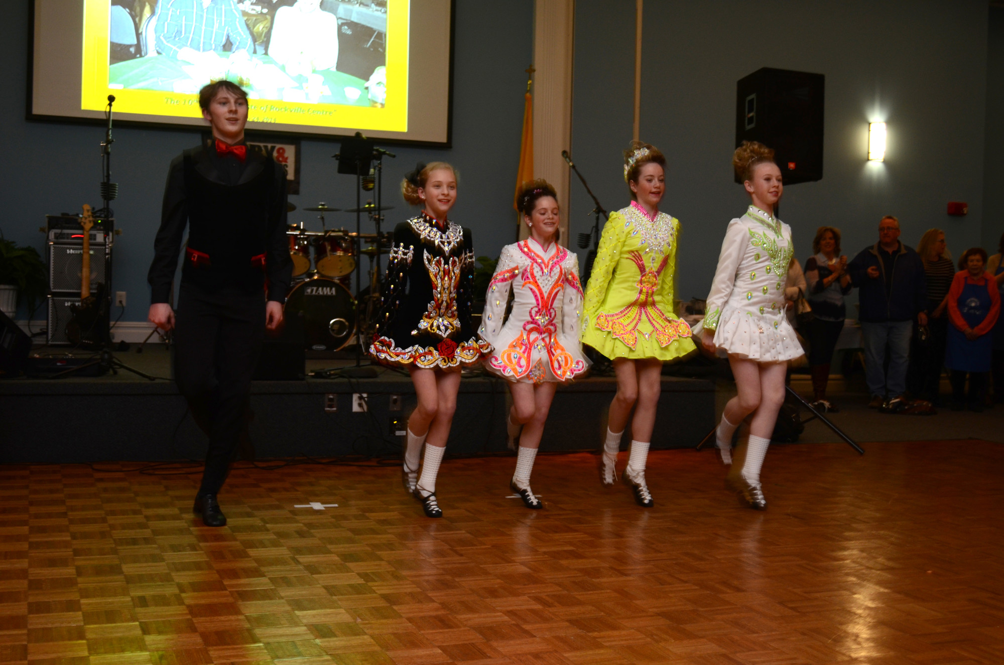 Shephard Sommers of Rockville Centre, left, Abigail Story of Baldwin, Madison Brower of Rockville Centre, Julia Meyers of Long Beach and Samantha Cosgrove of Rockville Centre, members of the Hagen School of Irish Dance, danced to Big Reel during the food and wine tasting.