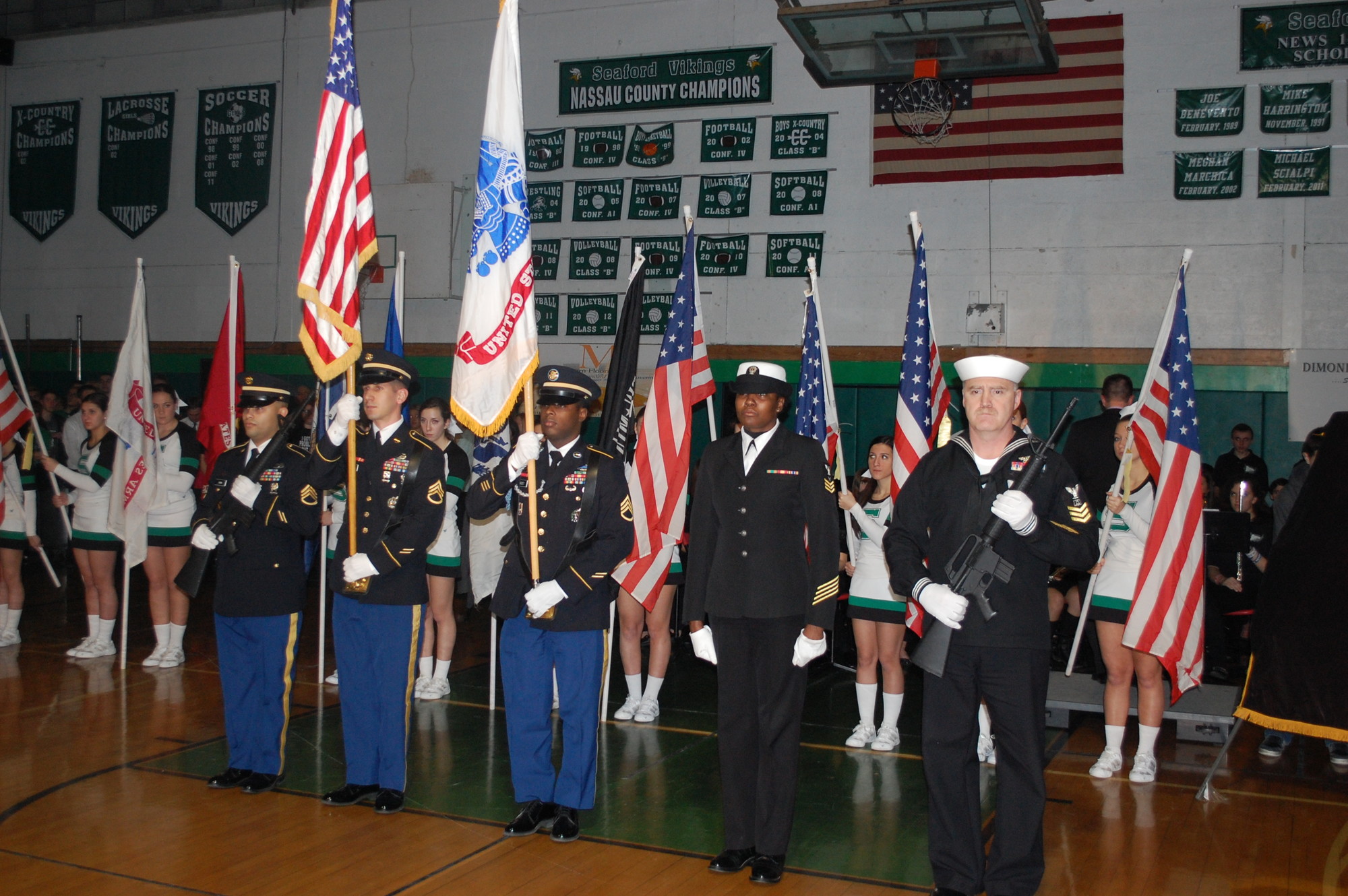 The ceremony included a military honor guard and a flag presentation by Seaford cheerleaders.