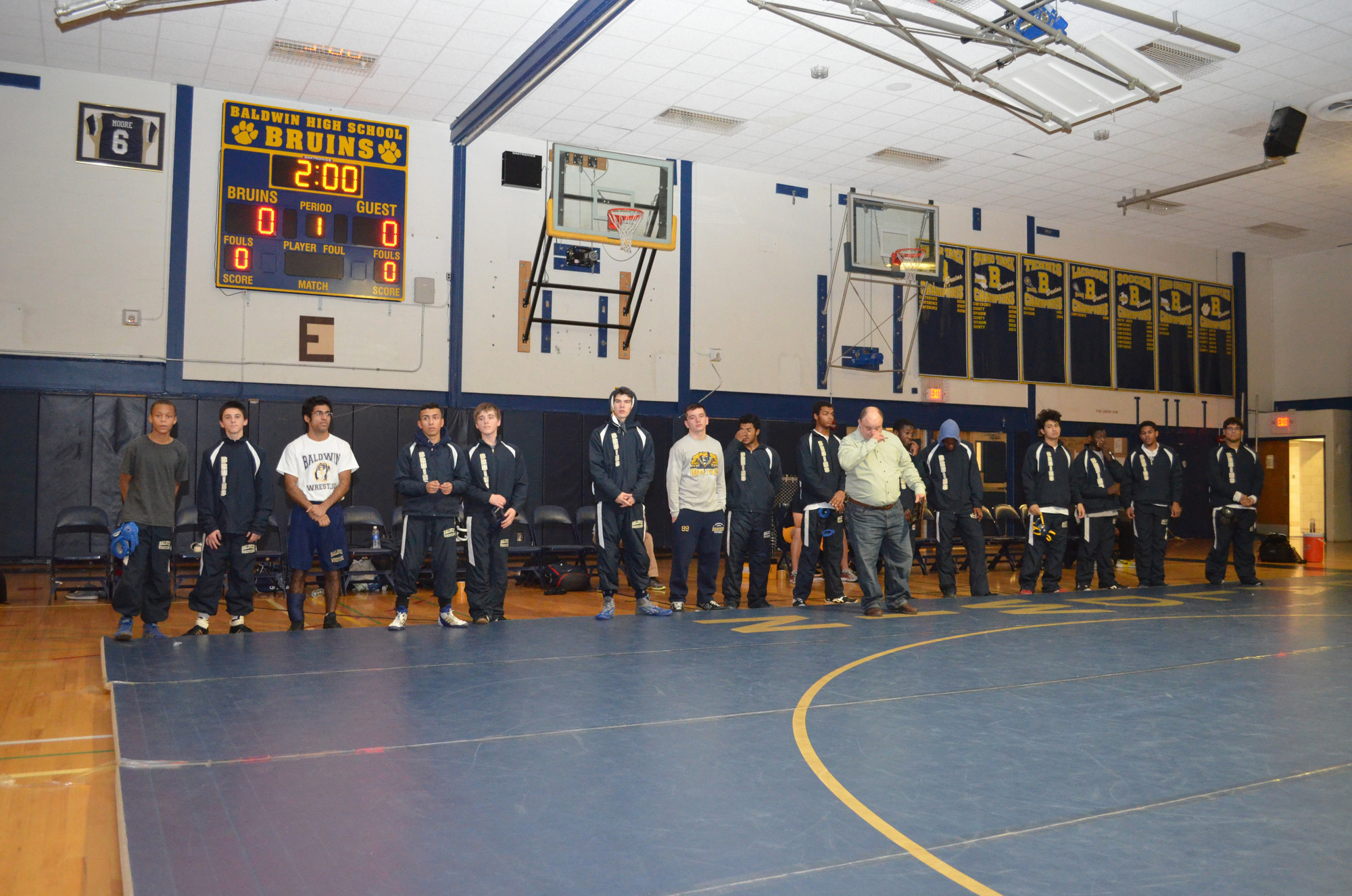 Current Baldwin High School wrestlers looked on as past coaches and wrestlers were honored on Jan. 21.